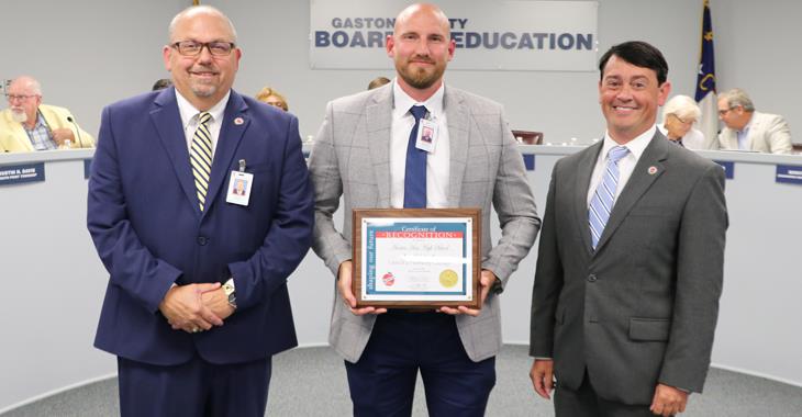 Hunter Huss High School assistant principal William Winston pictured with Board Chairman Jeff Ramsey and school principal Bryan Denton.